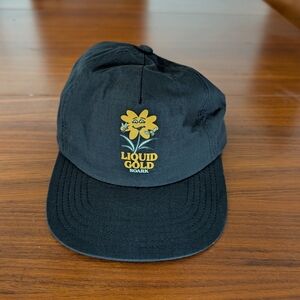 Roark Liquid Gold 5 Panel Black Cap with Yellow Flower Logo